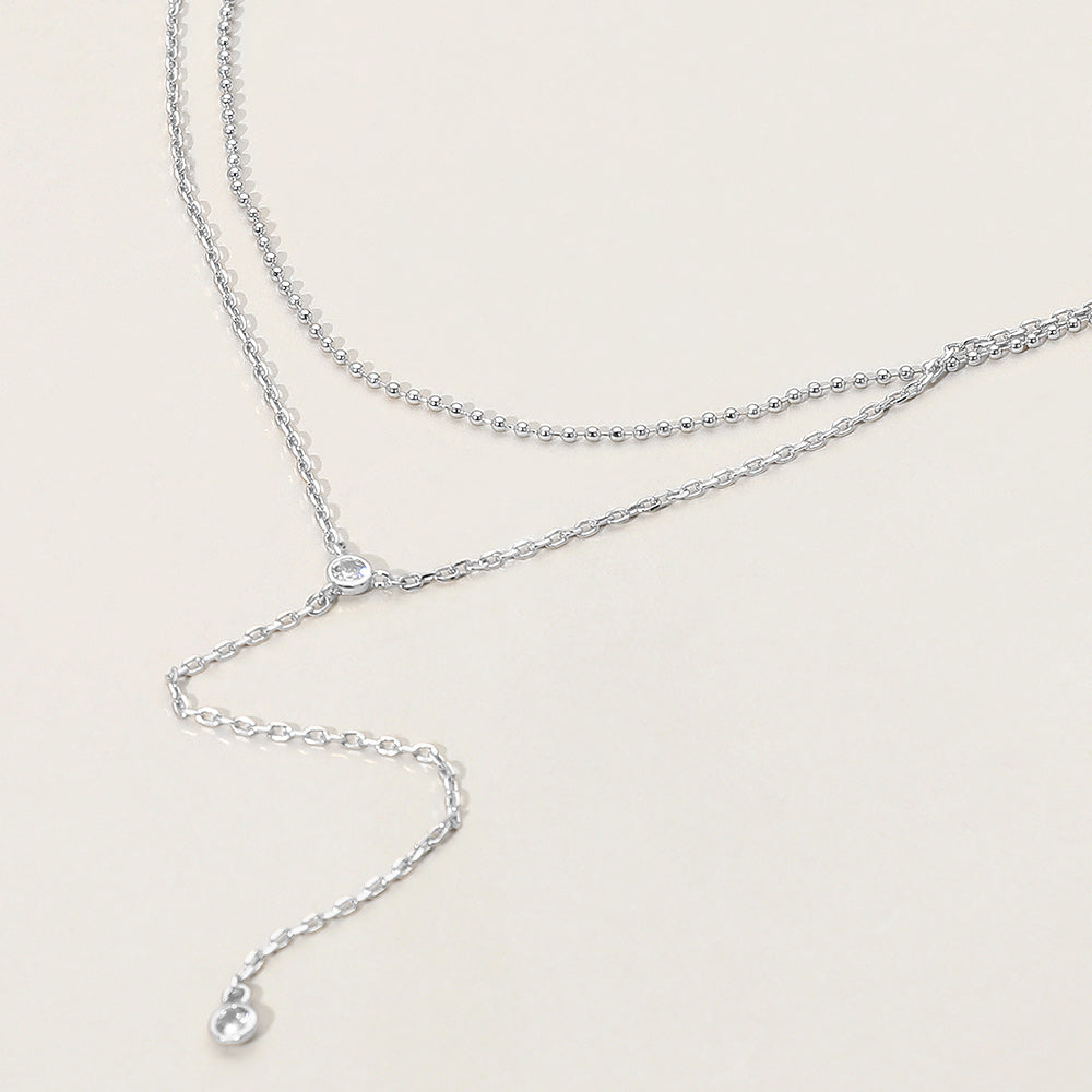 Rhodium Dropped Round Stone Double Layered Y Necklace