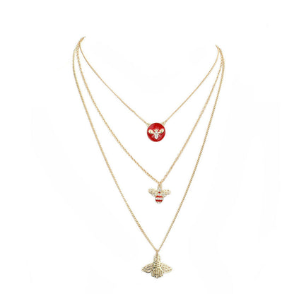 Burgundy Enamel Rhinestone Embellished Honey Bee Pendant Triple Layered Necklace, Get ready with these Pendant Triple Layered Necklace, put on a pop of color to complete your ensemble. Perfect for adding just the right amount of shimmer & shine. Perfect Birthday Gift, Anniversary Gift, Mother's Day Gift, Graduation Gift.