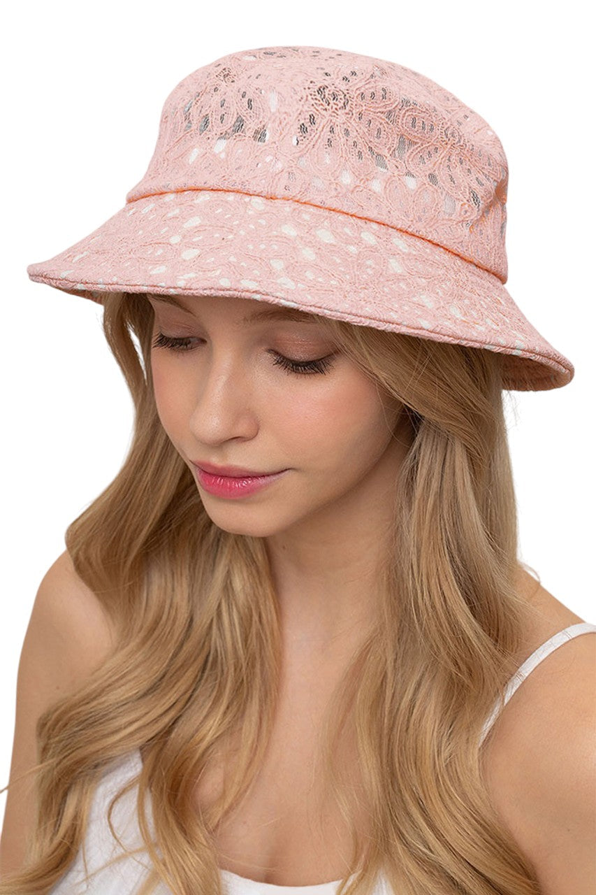 Pink FLORAL LACE BUCKET HAT combines a timeless silhouette with intricate lace patterning for a sophisticated accessory. The breathable construction offers optimal comfort while providing effective sun protection. Precision-crafted with durable materials, this versatile piece transitions seamlessly between casual and formal settings. The dimensional floral detailing adds texture and visual interest to any ensemble.