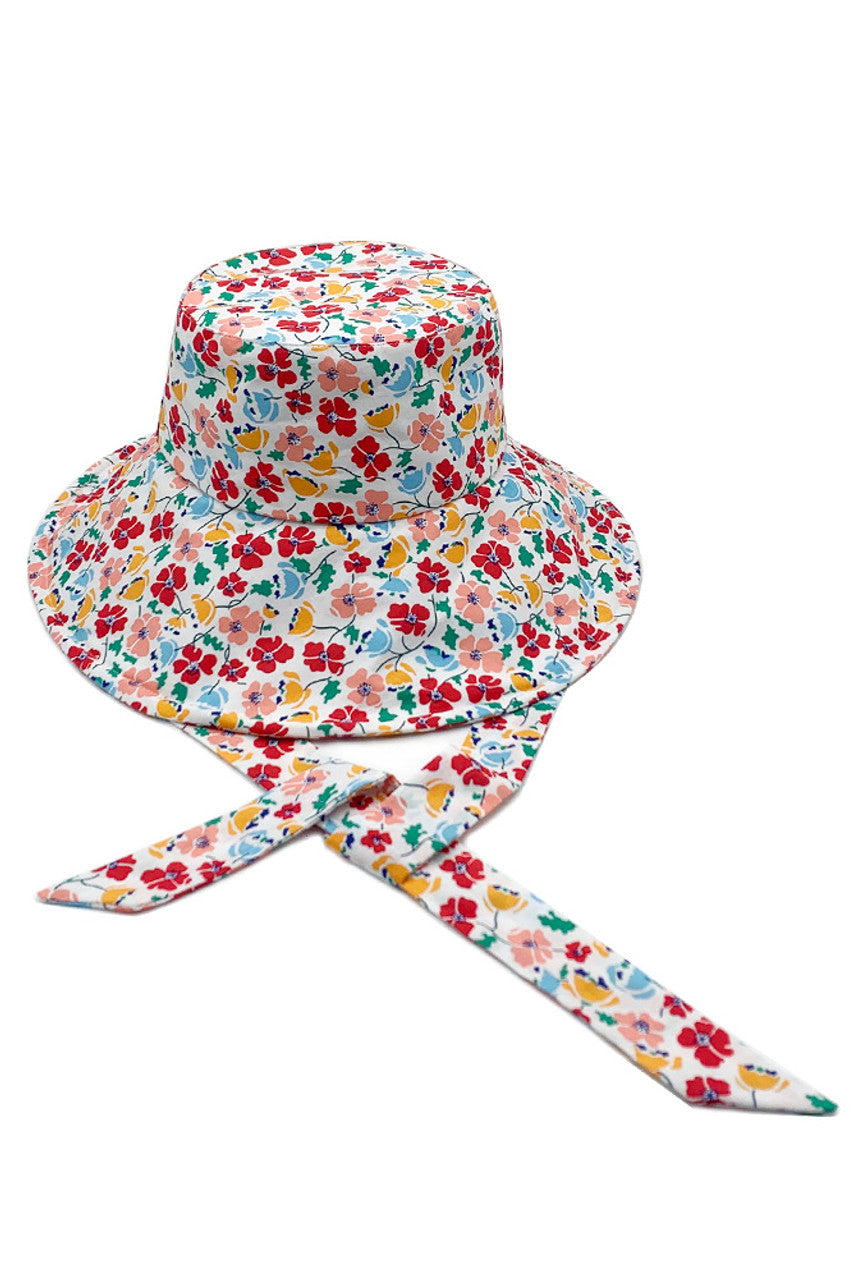Red FLORAL PRINT CHIN TIE BUCKET HAT combines an artfully rendered floral print with strategically placed chin ties for superior stability. Crafted from technical fabrics that deliver exceptional UV protection while maintaining breathability, it represents the pinnacle of headwear design. The structured silhouette ensures consistent shape retention throughout extended wear, making it an indispensable accessory for the style-conscious individual. 