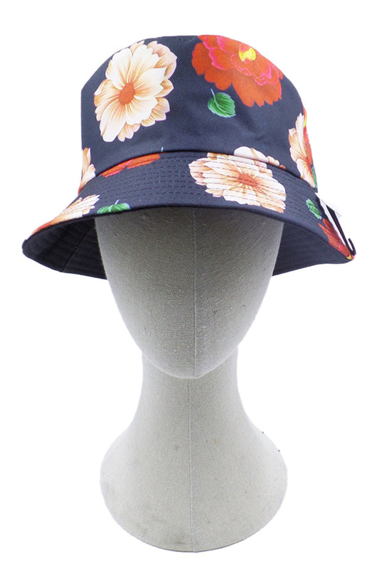 Blue Flower Print Bucket Hat combines fashion-forward design with practical sun protection. Crafted with durable materials, it features an all-over floral pattern that adds a distinctive touch to casual outfits. The classic bucket silhouette provides excellent coverage while maintaining breathability, making it ideal for outdoor activities or elevating everyday ensembles. 