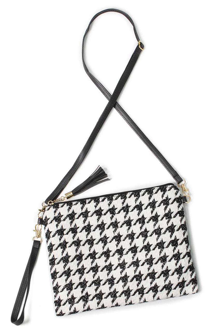 Houndstooth Pattern Crossbody Bag blends classic design with modern practicality. Featuring a distinctive houndstooth print, this bag offers a sophisticated look suitable for various occasions. Its compact size and adjustable strap provide comfortable, hands-free wear, while secure closures ensure your belongings stay protected. Crafted with attention to detail, it’s an ideal accessory for those seeking timeless style paired with everyday functionality. 