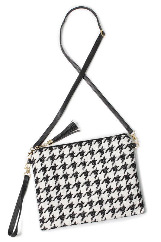 Houndstooth Pattern Crossbody Bag blends classic design with modern practicality. Featuring a distinctive houndstooth print, this bag offers a sophisticated look suitable for various occasions. Its compact size and adjustable strap provide comfortable, hands-free wear, while secure closures ensure your belongings stay protected. Crafted with attention to detail, it’s an ideal accessory for those seeking timeless style paired with everyday functionality. 