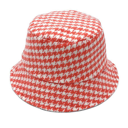 Coral Polyester Houndstooth Patterned Bucket Hat, this bucket hat doubles as a rain hat and is snug on the head and stays on well. It will work well to keep the rain off the head and out of the eyes and also the back of the neck. Wear it to lend a modern liveliness above a raincoat on trans-seasonal days in the city.