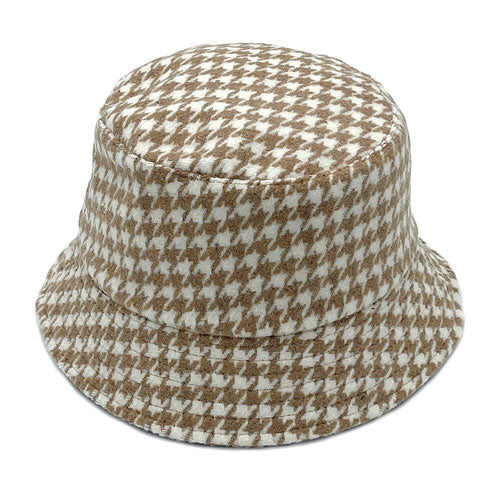 Beige Polyester Houndstooth Patterned Bucket Hat, this bucket hat doubles as a rain hat and is snug on the head and stays on well. It will work well to keep the rain off the head and out of the eyes and also the back of the neck. Wear it to lend a modern liveliness above a raincoat on trans-seasonal days in the city.