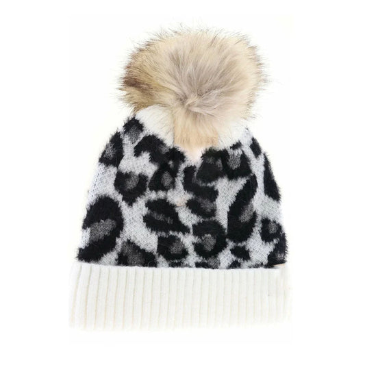 Ivory KIDS Leopard Pom C.C Beanie combines playful design with practical warmth, featuring a soft pom-pom and a trendy leopard print. Designed to fit comfortably on children’s heads, it offers reliable insulation for cooler weather while maintaining durability for everyday wear. This beanie is an expert choice for parents seeking both style and function in their child’s winter accessories. 
