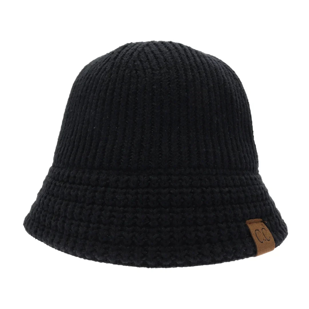 Blacck Knitted Cloche C.C Bucket Hat combines classic cloche styling with the casual appeal of a bucket hat, crafted from soft, durable knit fabric. Its structured yet flexible design offers comfortable wear and a flattering fit, making it an ideal accessory for cooler seasons. This hat offers both warmth and style, making it perfect for adding a sophisticated edge to everyday outfits. 