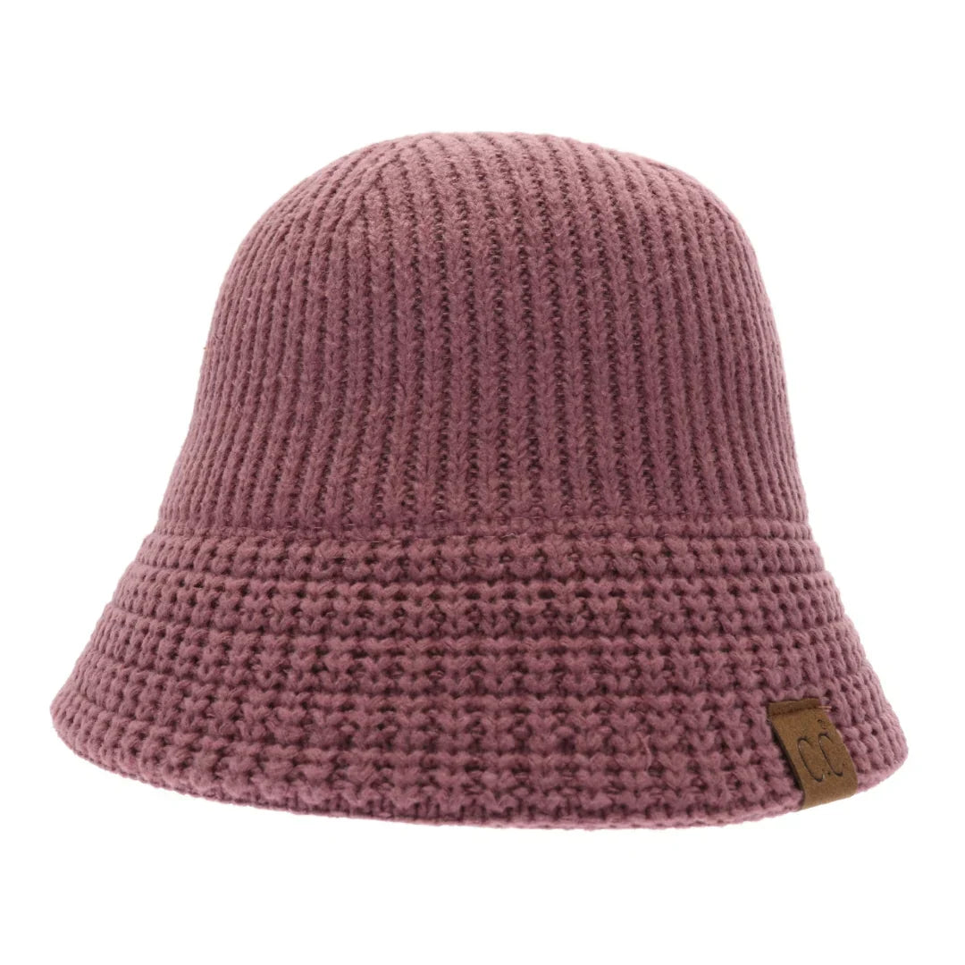 CocoBerry Knitted Cloche C.C Bucket Hat combines classic cloche styling with the casual appeal of a bucket hat, crafted from soft, durable knit fabric. Its structured yet flexible design offers comfortable wear and a flattering fit, making it an ideal accessory for cooler seasons. This hat offers both warmth and style, making it perfect for adding a sophisticated edge to everyday outfits. 