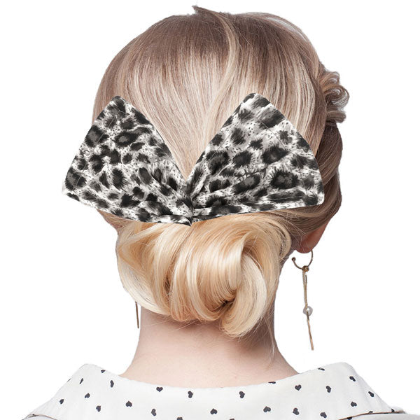 Leopard Patterned Deft Bun Maker Hair Band. Deft Bun Maker Hair Band making you feel extra glamorous. Push back your hair with this pretty Bun Maker Hair Band, add a pop of color to any plain outfit! Be ready to receive compliments. Be the ultimate trendsetter wearing this chic headband with all your stylish outfits!