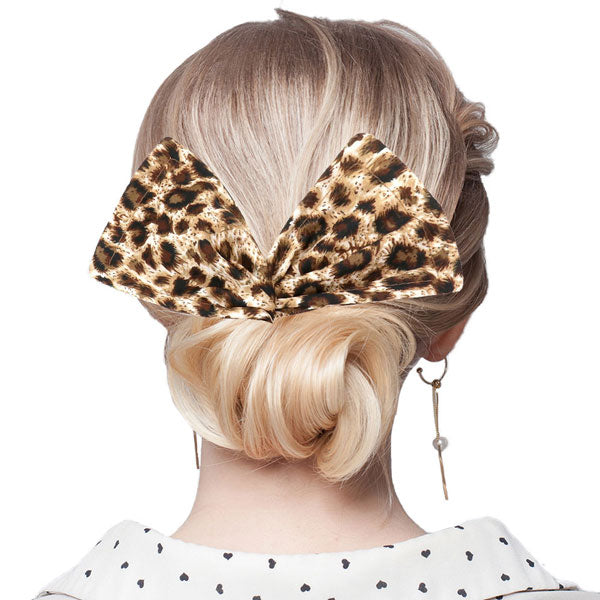 Leopard Patterned Deft Bun Maker Hair Band. Deft Bun Maker Hair Band making you feel extra glamorous. Push back your hair with this pretty Bun Maker Hair Band, add a pop of color to any plain outfit! Be ready to receive compliments. Be the ultimate trendsetter wearing this chic headband with all your stylish outfits!c