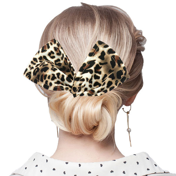 Leopard Patterned Deft Bun Maker Hair Band. Deft Bun Maker Hair Band making you feel extra glamorous. Push back your hair with this pretty Bun Maker Hair Band, add a pop of color to any plain outfit! Be ready to receive compliments. Be the ultimate trendsetter wearing this chic headband with all your stylish outfits!