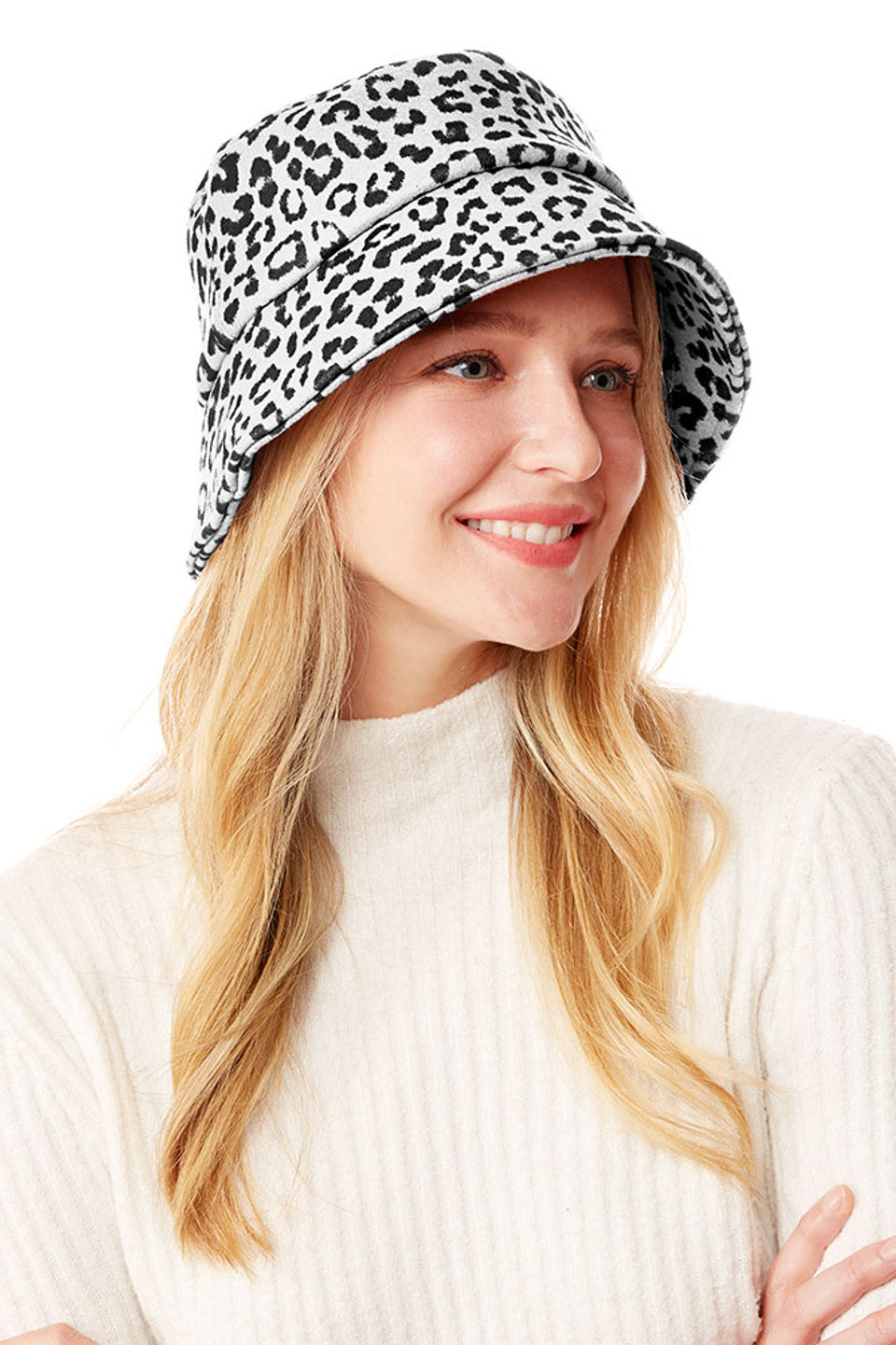 White Leopard Print Bucket Hat combines timeless style with practical sun protection. Crafted with quality materials, it features a structured crown and, comfortable fit for all-day wear. The classic animal print adds a sophisticated edge to casual outfits while the wide brim provides effective shade. Perfect for elevating your everyday wardrobe or completing your vacation essentials. 