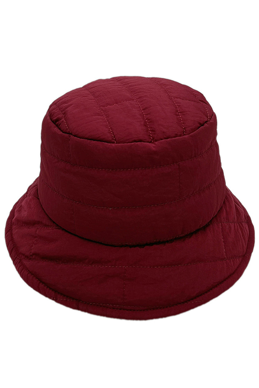 Burgundy Lined Padding Bucket Hat features a lined interior with strategic padding for exceptional comfort and insulation. Crafted with durable materials to withstand daily wear while maintaining its structured silhouette. The versatile design offers reliable sun protection with a practical brim width that balances coverage and visibility for all-season wear. 