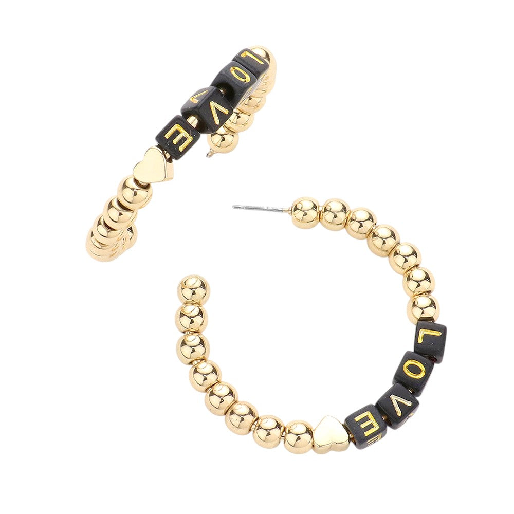 Black LOVE Metal Ball Half Hoop Message Earrings are a stylish addition to any outfit. The metal ball half hoop design adds a touch of modern flair, while the LOVE message adds a sweet and romantic touch. Crafted with high-quality materials, these earrings are both fashionable and durable. Perfect for any occasion.