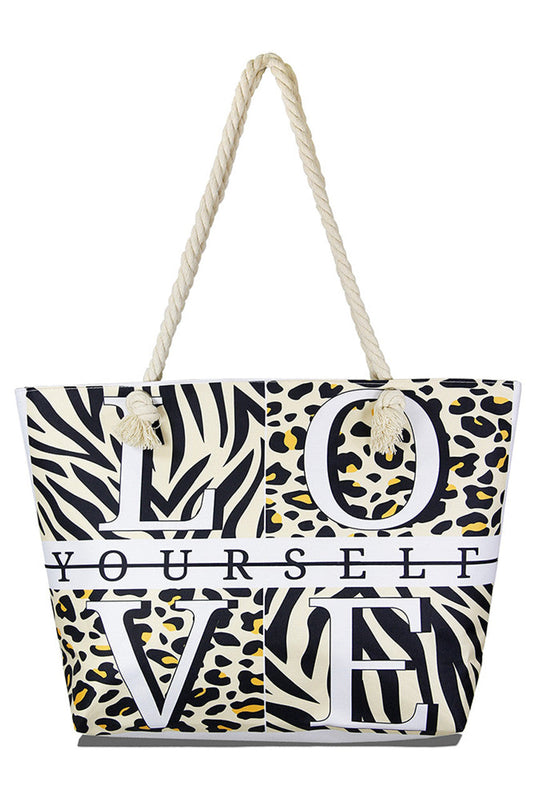 Love Yourself Animal Print Beach Bag combines stylish design with practical functionality. Crafted from durable materials, it offers ample space for all your beach essentials while its eye-catching animal print adds a fashionable touch. Lightweight and easy to carry, this bag is perfect for those who want to stay organized and make a statement by the shore.