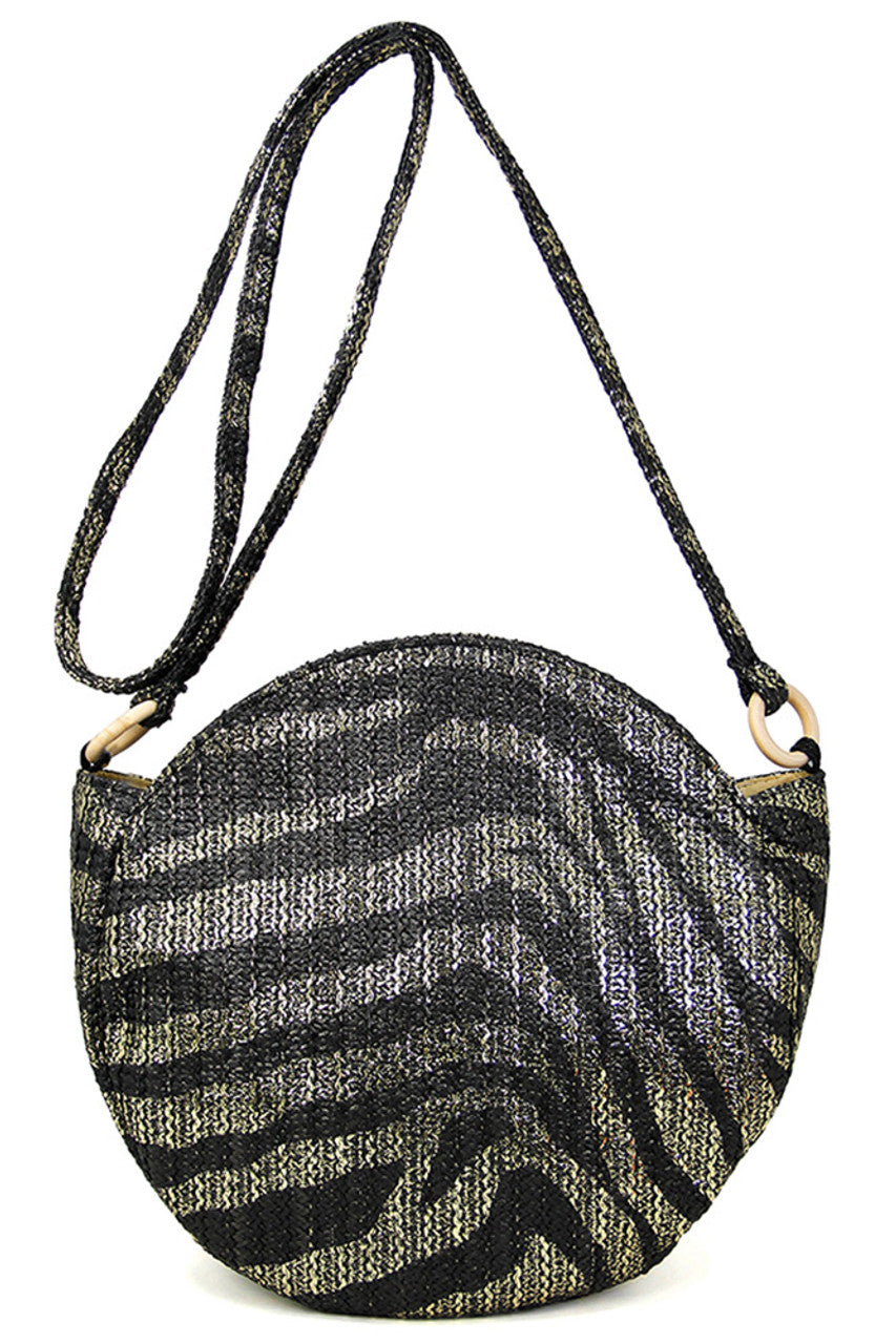 Metallic Zebra Print Round Bag offers a sophisticated blend of bold design and expert craftsmanship. Featuring a striking metallic zebra pattern on a sleek round shape, this bag provides a distinctive look while maintaining a practical size for daily essentials. Ideal for those seeking a statement accessory that combines contemporary style with reliable functionality.