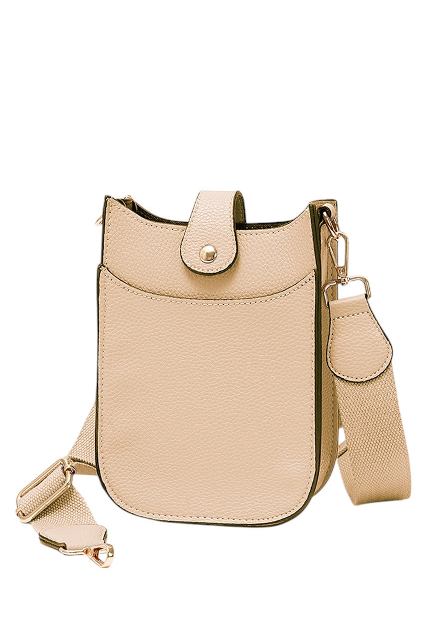 Mini PU Cellphone Cross Body Bag offers a sleek and practical solution for carrying your essentials. Crafted from durable PU leather, this design provides a lightweight yet sturdy protection that keeps your phone easily accessible. The adjustable crossbody strap ensures comfortable wear throughout the day, making it ideal for hands-free convenience during travel or daily errands. Its compact size fits most smartphones and small personal items, combining style with functionality for the modern user. 