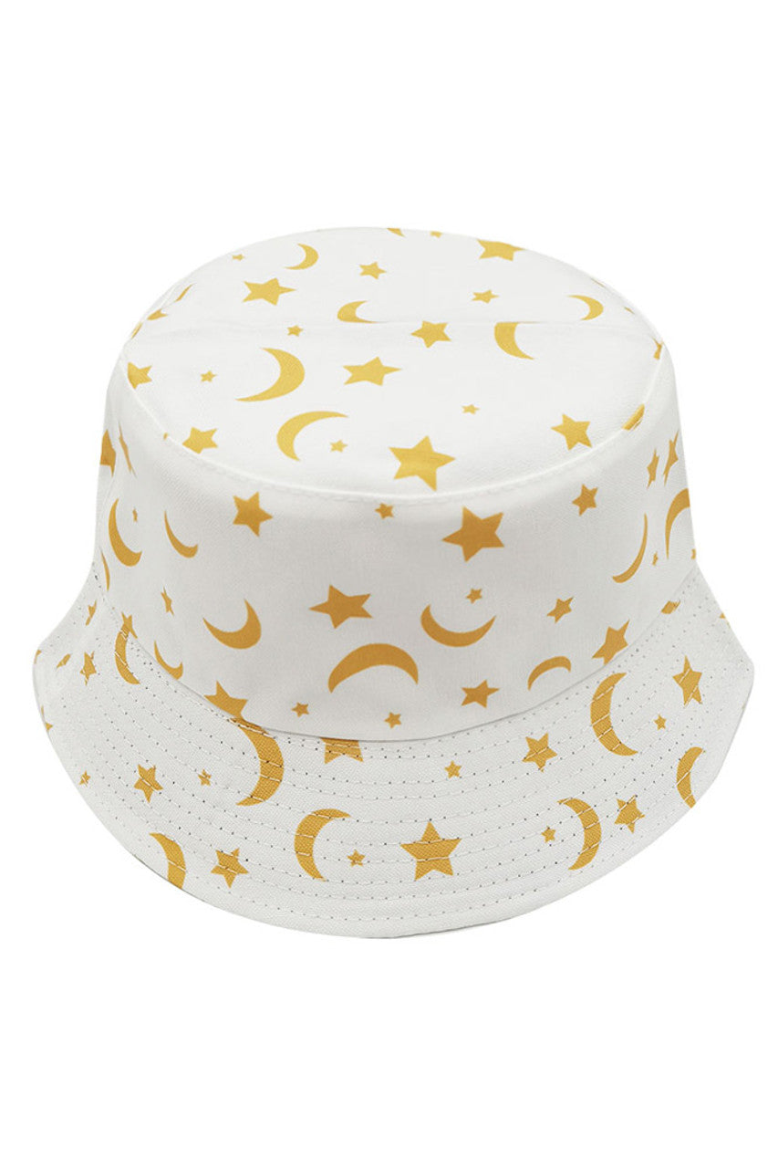 White MOON AND STAR PRINT BUCKET HAT features celestial imagery on premium fabric. The structured silhouette offers superior sun protection while the astronomical pattern delivers sophisticated visual interest. Engineered with reinforced stitching for durability and an adjustable fit, it's an essential accessory for the discerning customer seeking both functionality and distinctive style. 