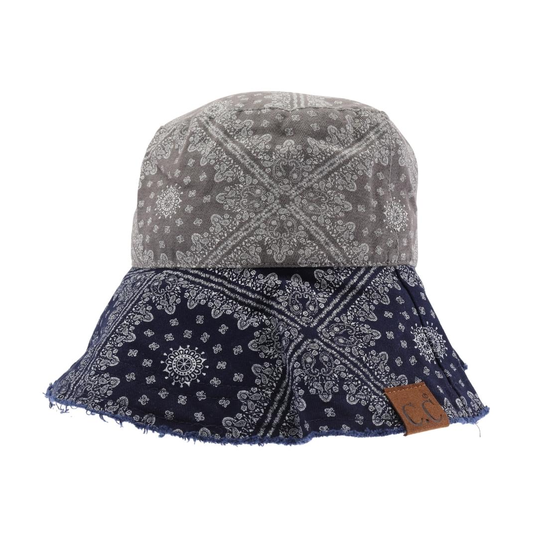 Grey Multi Color Paisley Bandana C.C Bucket Hat combines classic paisley patterns with vibrant colors for a stylish, versatile accessory. Crafted for comfort and durability, this bucket hat offers sun protection while enhancing your outfit with a timeless design. Perfect for outdoor activities or casual wear, it balances fashion and function effortlessly. 