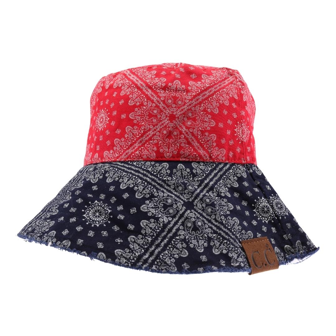 red Multi Color Paisley Bandana C.C Bucket Hat combines classic paisley patterns with vibrant colors for a stylish, versatile accessory. Crafted for comfort and durability, this bucket hat offers sun protection while enhancing your outfit with a timeless design. Perfect for outdoor activities or casual wear, it balances fashion and function effortlessly. 