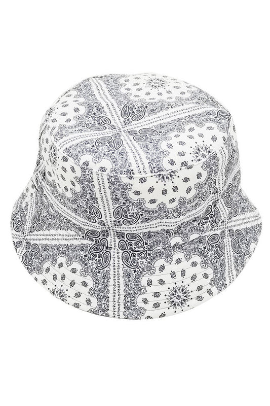 White PAISLEY PRINT BUCKET HAT features an elaborate swirling pattern executed with technical precision. The structured crown and flexible brim offer optimal facial coverage while maintaining a fashion-forward silhouette. Engineered with superior materials for enhanced breathability and shape retention, making it an essential accessory for discerning style enthusiasts. 