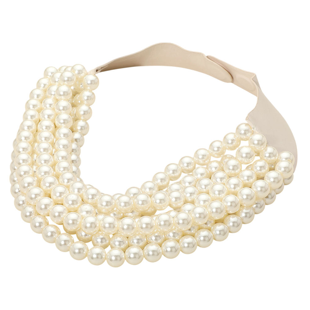 Cream Pearl Beaded Multi-Layered Faux Leather Magnetic Necklace combines elegant design with functional craftsmanship. Featuring multiple strands of soft faux leather accented by carefully placed pearl beads, it offers a layered, textured look that enhances any ensemble. The magnetic closure provides effortless fastening while ensuring a secure fit, making it an ideal accessory for both professional and casual settings.