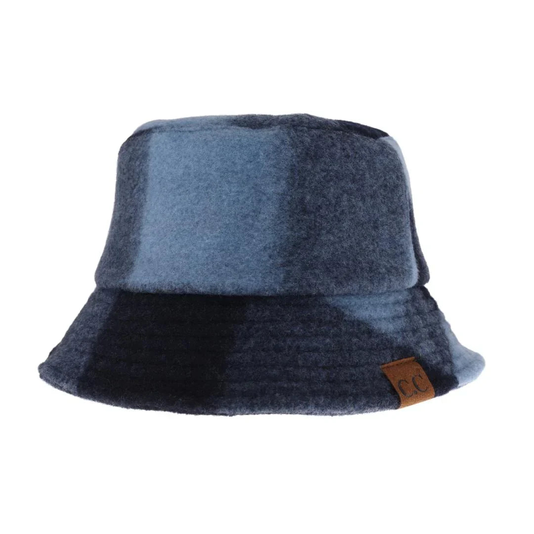 Navy multi Plaid C.C Bucket Hat combines classic style with practical design, featuring a timeless plaid pattern that complements any outfit. Crafted for comfort and durability, this hat offers reliable sun protection while maintaining breathability. Its versatile look makes it an essential accessory for both casual and outdoor wear, ensuring you stay stylish and shielded throughout the day. 