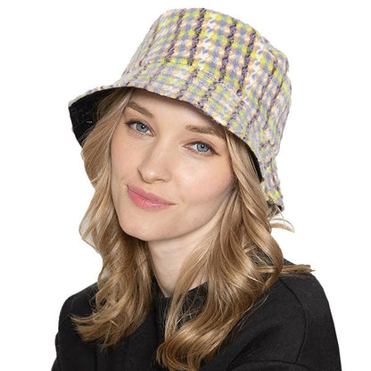 Lavender Polyester Plaid Check Patterned Bucket Hat, this bucket hat doubles as a rain hat and is snug on the head and stays on well. It will work well to keep the rain off the head and out of the eyes and also the back of the neck. Wear it to lend a modern liveliness above a raincoat on trans-seasonal days in the city.