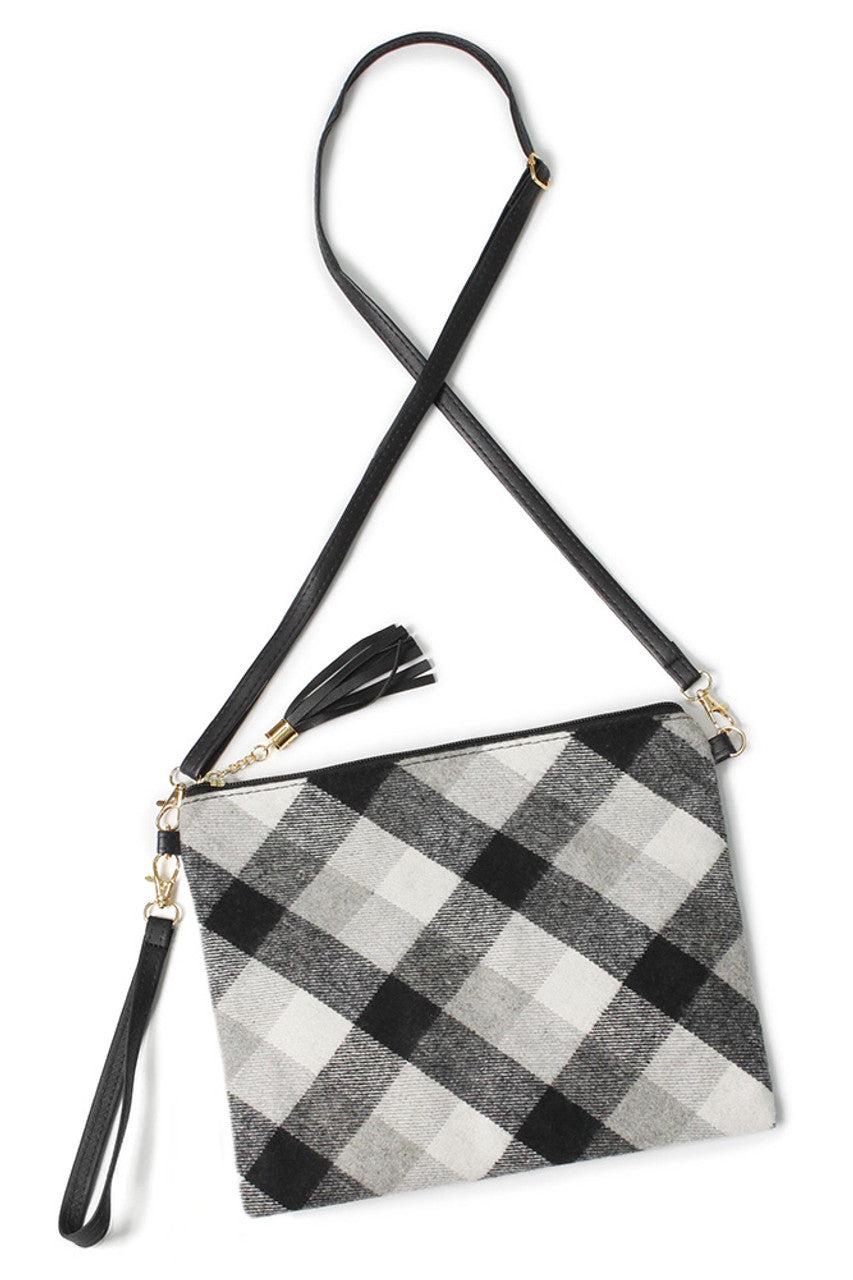 Plaid Pattern Crossbody Bag combines timeless style with practical design. Crafted with a classic plaid pattern, this bag offers a versatile accessory that complements various outfits. Its compact size and adjustable strap provide comfortable, hands-free carrying, ideal for daily use or travel. Durable materials ensure long-lasting wear, while the secure closure keeps your essentials safe. Perfect for those seeking a blend of fashion and functionality in a single accessory. 