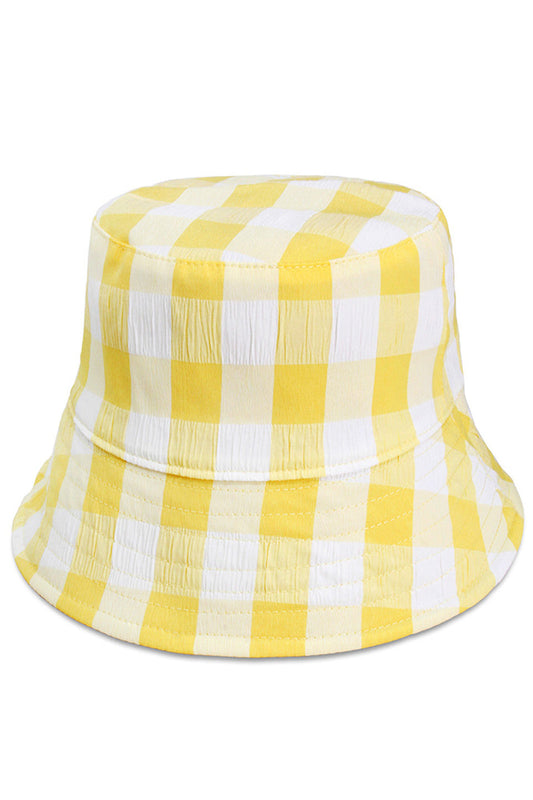 Yellow PLAID REVERSIBLE WIRED BRIM BUCKET HAT features a versatile reversible design with a classic plaid pattern. The wired brim provides customizable structure, allowing you to shape it to your preference while maintaining its form throughout wear. Constructed with quality materials for durability and style, this hat offers practical sun protection with sophisticated aesthetic appeal. 