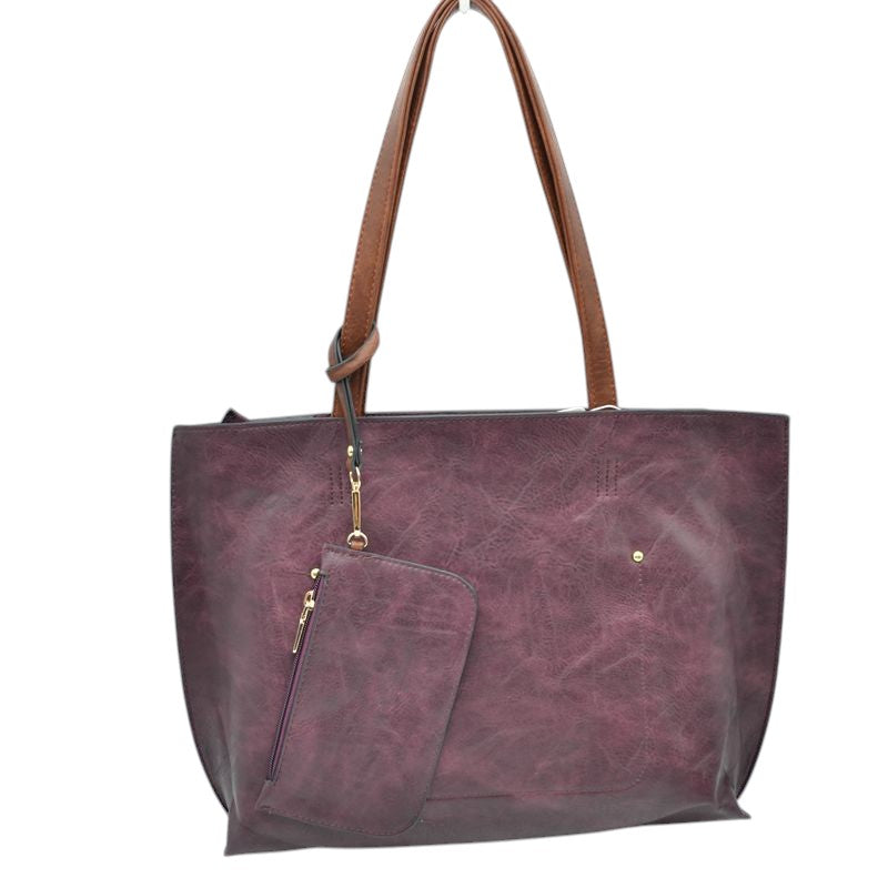 The Soft PU Vegan Leather 2 in-1 Tote Crossbody Handbag with Detachable Wristlet Coin Purse, Best Seller Tote, Handbag has plenty of room to fit all your items, available in a few colours. Handbag also comes with a removable insert bag that doubles as lining to the bag or can be removed and worn as a crossbody bag. This 2 in 1 tote bag is just what the boss lady needs