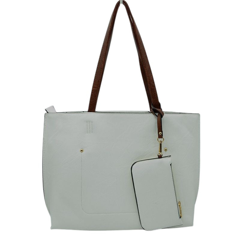 The Soft PU Vegan Leather 2 in-1 Tote Crossbody Handbag with Detachable Wristlet Coin Purse, Best Seller Tote, Handbag has plenty of room to fit all your items, available in a few colours. Handbag also comes with a removable insert bag that doubles as lining to the bag or can be removed and worn as a crossbody bag. This 2 in 1 tote bag is just what the boss lady needs