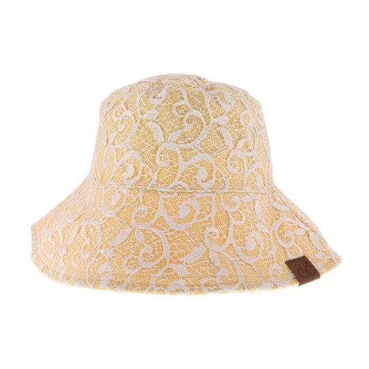 Honey-Mustard- Reversible Lace C.C Bucket Hat combines sophisticated lace detailing with practical design, offering two distinct styles in one accessory. Crafted for durability and comfort, this hat features a breathable fabric that ensures a comfortable fit while providing sun protection. Its reversible nature allows seamless transition between a delicate lace look and a classic bucket hat style, making it a versatile addition to any wardrobe. Perfect for those who appreciate both elegance and functionalit