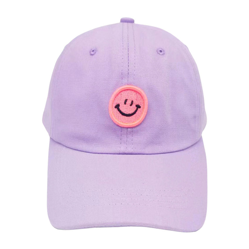 Ready for action in the sunshine, this Smile Accented Purple Lilac  Baseball Cap will keep you cool like a cucumber! Keep the sun off your face and your style on point with this sturdy and adjustable cotton cap! Get your sunny day swag on with this rockin' headgear! Perfect Birthday gift, Anniversary, Valentine's Day gift.
