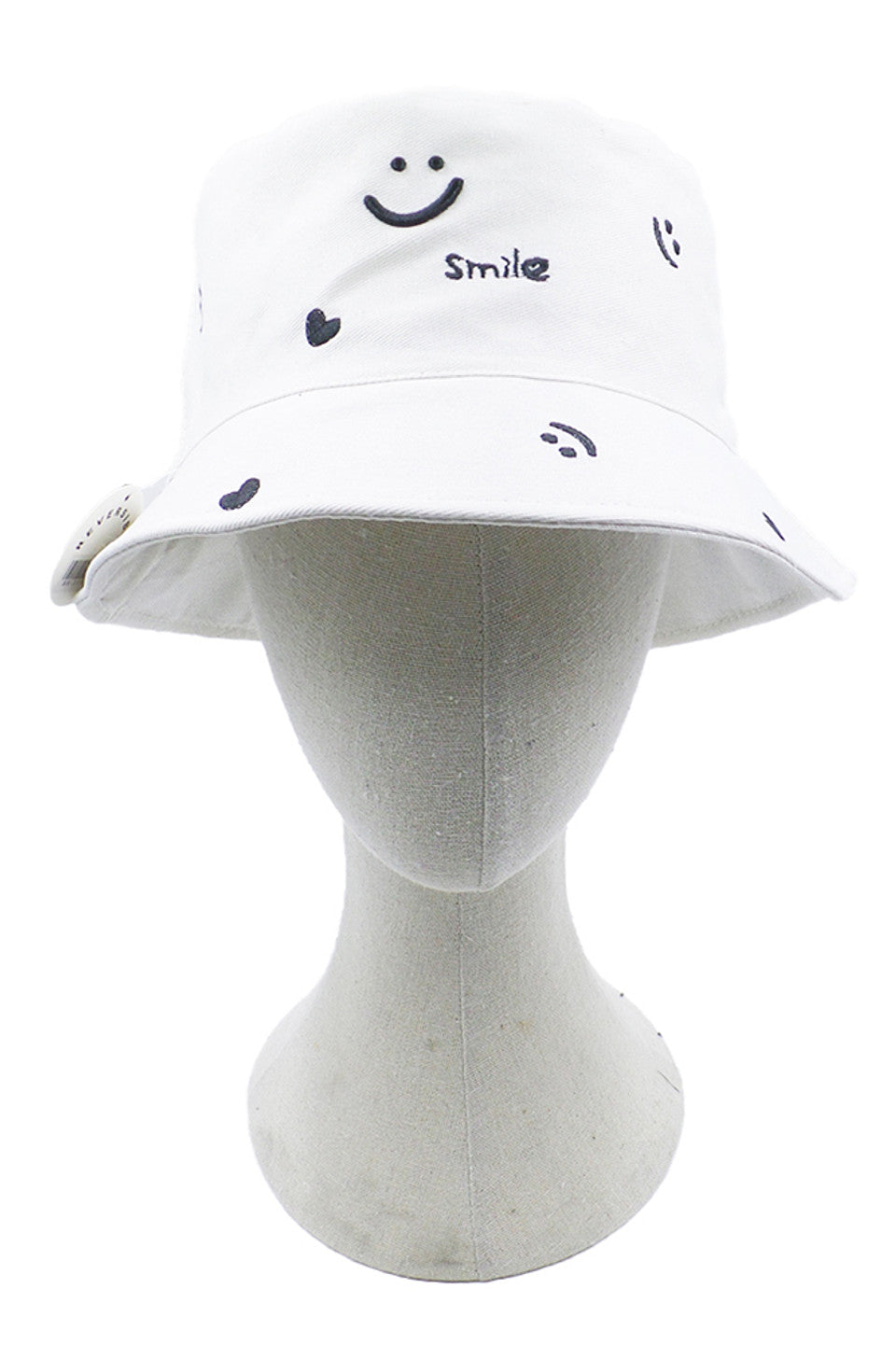White Smile and Heart Pattern Bucket Hat features an eye-catching smile and heart pattern, expertly designed to balance whimsical aesthetics with functional headwear. The structured silhouette maintains its shape while providing optimal sun protection with a substantial brim. Superior stitching and quality materials ensure durability through regular wear, making it an essential accessory for the discerning customer seeking both style and practicality.