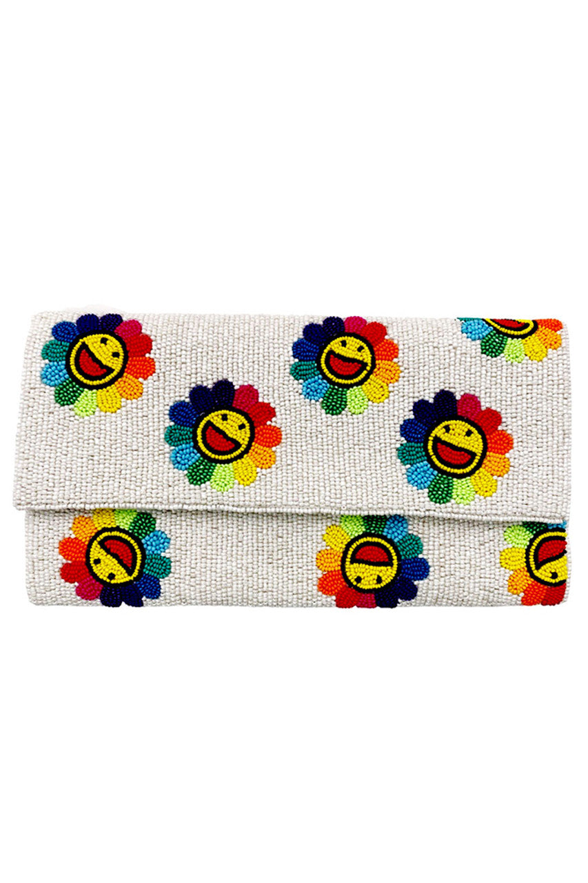 Smile Face Glass Beads Clutch is a finely crafted accessory that blends playful charm with expert design. Featuring a detailed smiley face pattern made from high-quality glass beads, this clutch offers a distinctive look perfect for adding personality to your ensemble. Its compact and sturdy construction ensures practicality and style, making it an excellent choice for both casual and formal occasions. 