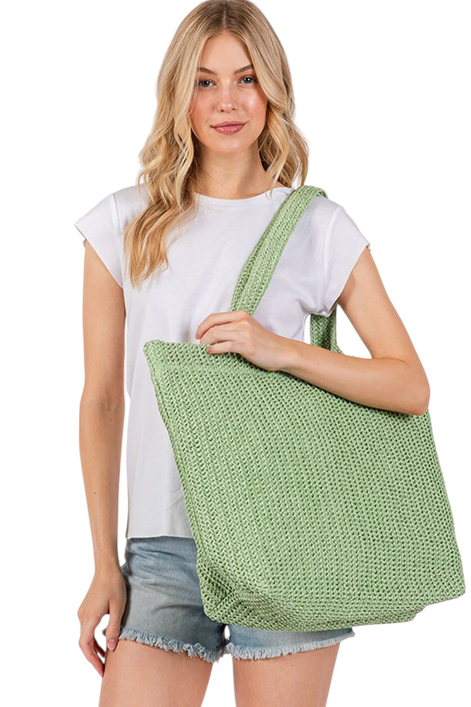 Olive Solid Color Crochet Summer Straw Tote Bag combines timeless craftsmanship with practical design. Handwoven from durable straw, its crochet pattern offers breathability and lightweight comfort, making it ideal for warm-weather outings. The spacious interior accommodates essentials effortlessly, while the sturdy handles ensure easy carrying. Perfect for beach trips, casual strolls, or everyday use, this tote blends style and function for a refined summer accessory. 