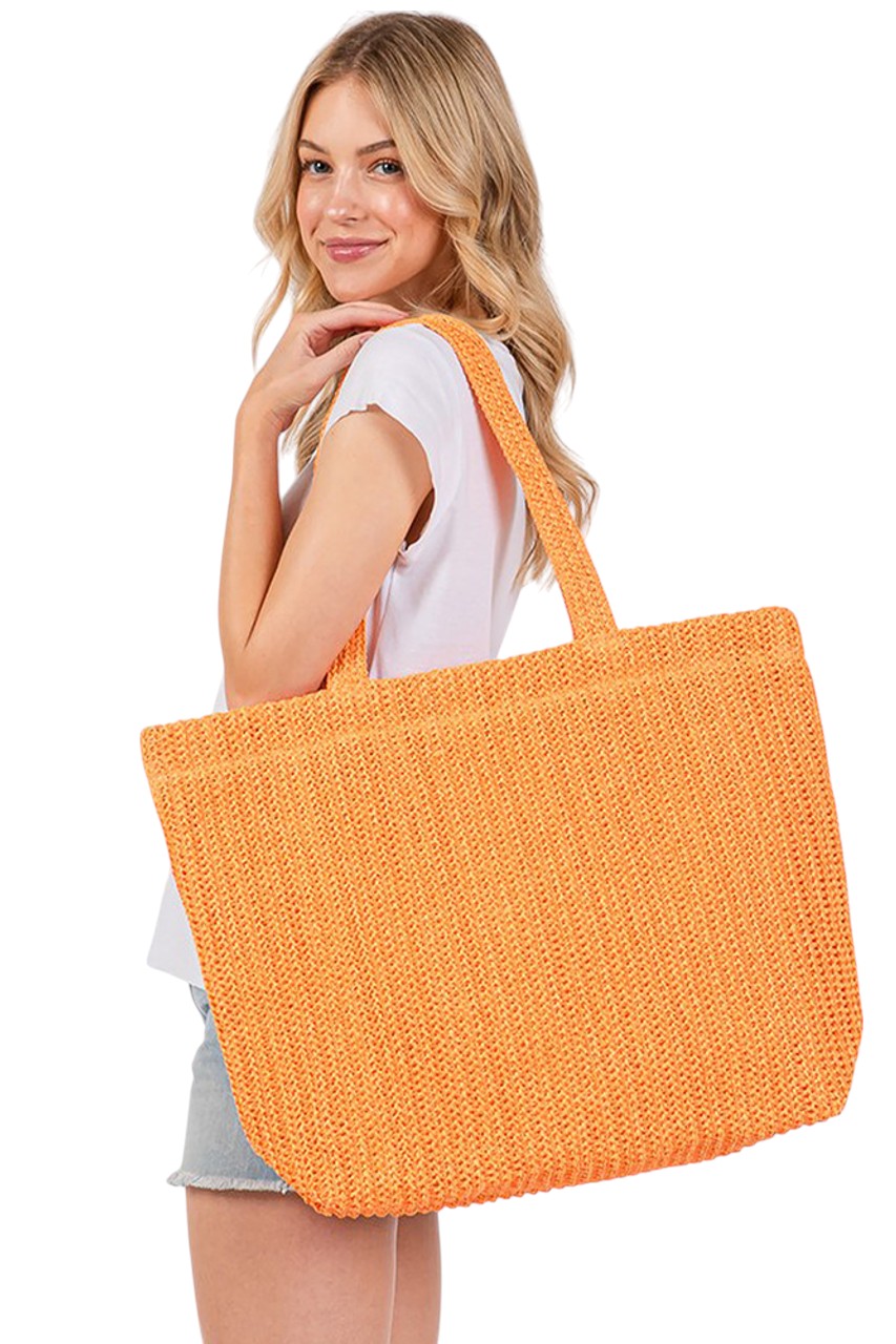 Orange Solid Color Crochet Summer Straw Tote Bag combines timeless craftsmanship with practical design. Handwoven from durable straw, its crochet pattern offers breathability and lightweight comfort, making it ideal for warm-weather outings. The spacious interior accommodates essentials effortlessly, while the sturdy handles ensure easy carrying. Perfect for beach trips, casual strolls, or everyday use, this tote blends style and function for a refined summer accessory. 