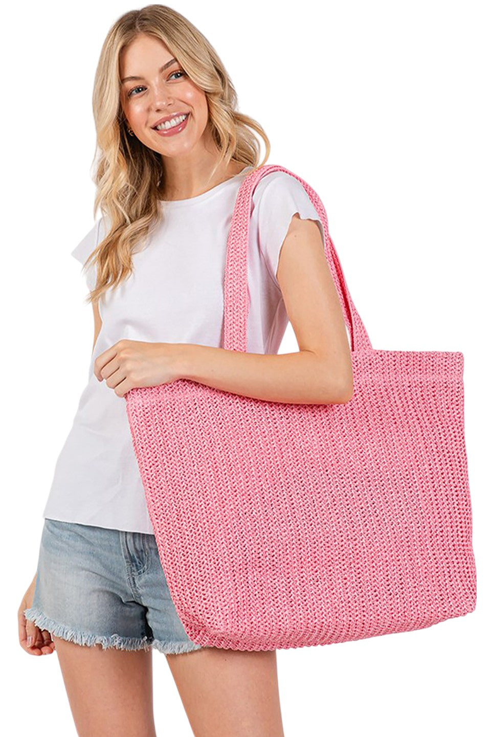 Pink Solid Color Crochet Summer Straw Tote Bag combines timeless craftsmanship with practical design. Handwoven from durable straw, its crochet pattern offers breathability and lightweight comfort, making it ideal for warm-weather outings. The spacious interior accommodates essentials effortlessly, while the sturdy handles ensure easy carrying. Perfect for beach trips, casual strolls, or everyday use, this tote blends style and function for a refined summer accessory. 