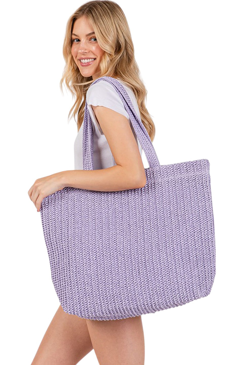 Purple Solid Color Crochet Summer Straw Tote Bag combines timeless craftsmanship with practical design. Handwoven from durable straw, its crochet pattern offers breathability and lightweight comfort, making it ideal for warm-weather outings. The spacious interior accommodates essentials effortlessly, while the sturdy handles ensure easy carrying. Perfect for beach trips, casual strolls, or everyday use, this tote blends style and function for a refined summer accessory. 