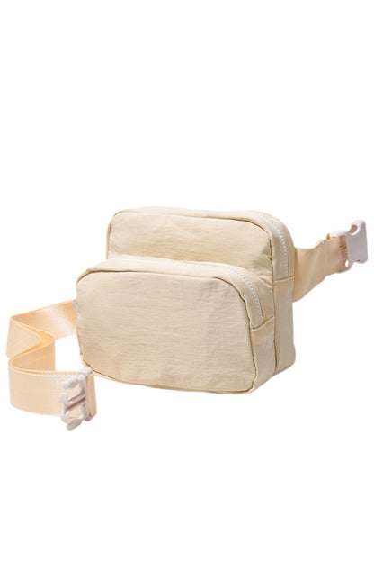 Solid Double Zipper Fanny Pack offers practical organization with two separate compartments, allowing you to store essentials while keeping them easily accessible and secure. Its durable construction ensures long-lasting use, making it ideal for travel, outdoor activities, or daily errands. The adjustable strap provides a comfortable fit, combining convenience and functionality in a sleek, minimalist design.