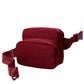 Solid Double Zipper Fanny Pack offers practical organization with two separate compartments, allowing you to store essentials while keeping them easily accessible and secure. Its durable construction ensures long-lasting use, making it ideal for travel, outdoor activities, or daily errands. The adjustable strap provides a comfortable fit, combining convenience and functionality in a sleek, minimalist design.