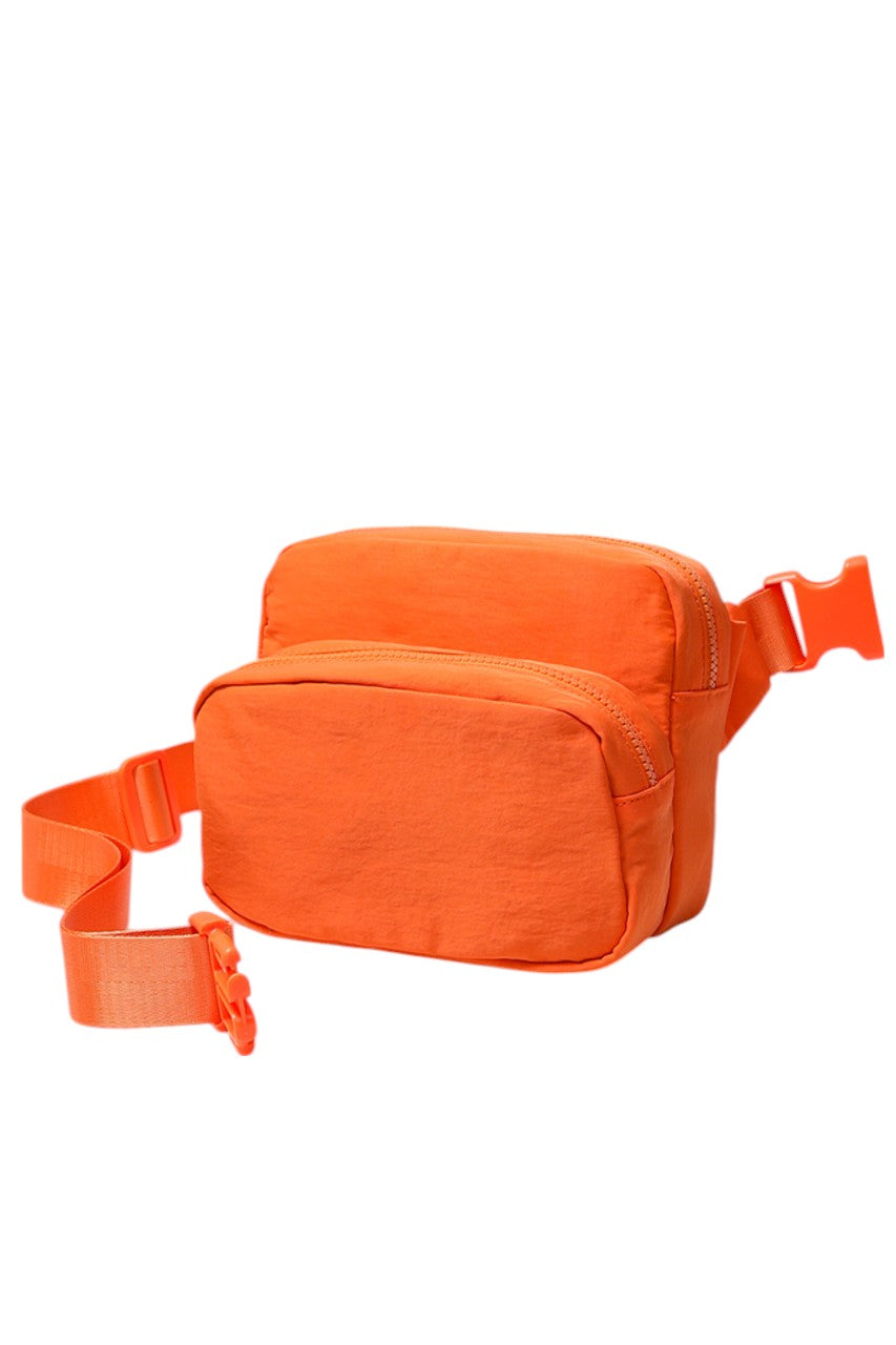Solid Double Zipper Fanny Pack offers practical organization with two separate compartments, allowing you to store essentials while keeping them easily accessible and secure. Its durable construction ensures long-lasting use, making it ideal for travel, outdoor activities, or daily errands. The adjustable strap provides a comfortable fit, combining convenience and functionality in a sleek, minimalist design.