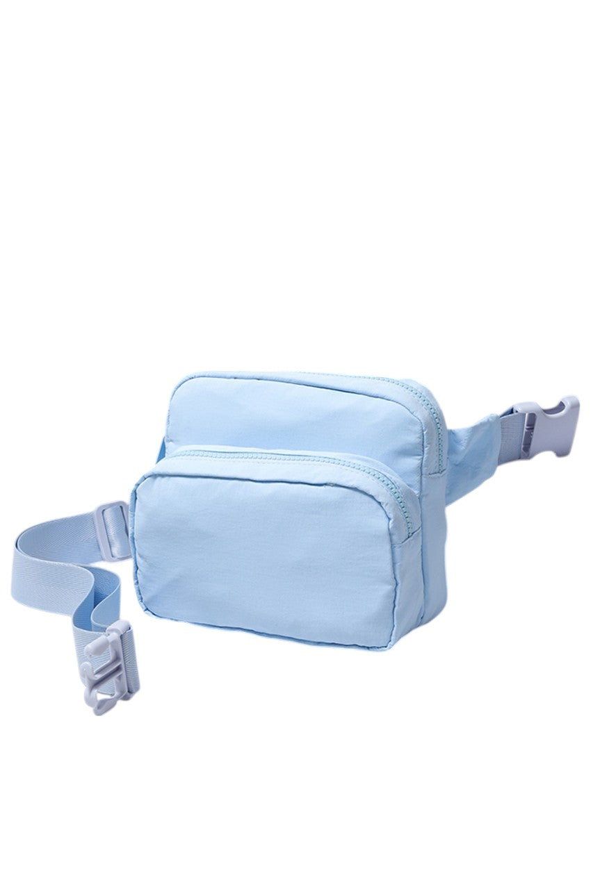 Solid Double Zipper Fanny Pack offers practical organization with two separate compartments, allowing you to store essentials while keeping them easily accessible and secure. Its durable construction ensures long-lasting use, making it ideal for travel, outdoor activities, or daily errands. The adjustable strap provides a comfortable fit, combining convenience and functionality in a sleek, minimalist design.