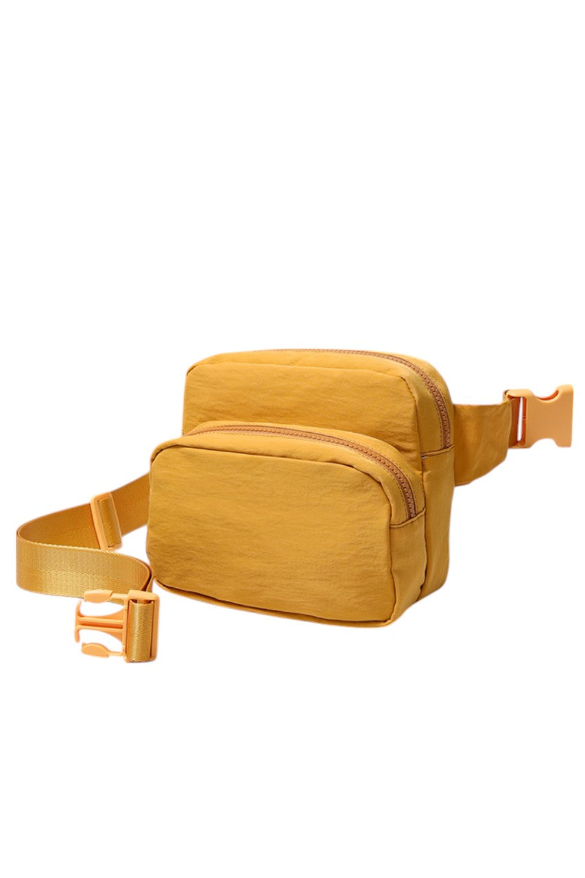 Solid Double Zipper Fanny Pack offers practical organization with two separate compartments, allowing you to store essentials while keeping them easily accessible and secure. Its durable construction ensures long-lasting use, making it ideal for travel, outdoor activities, or daily errands. The adjustable strap provides a comfortable fit, combining convenience and functionality in a sleek, minimalist design.