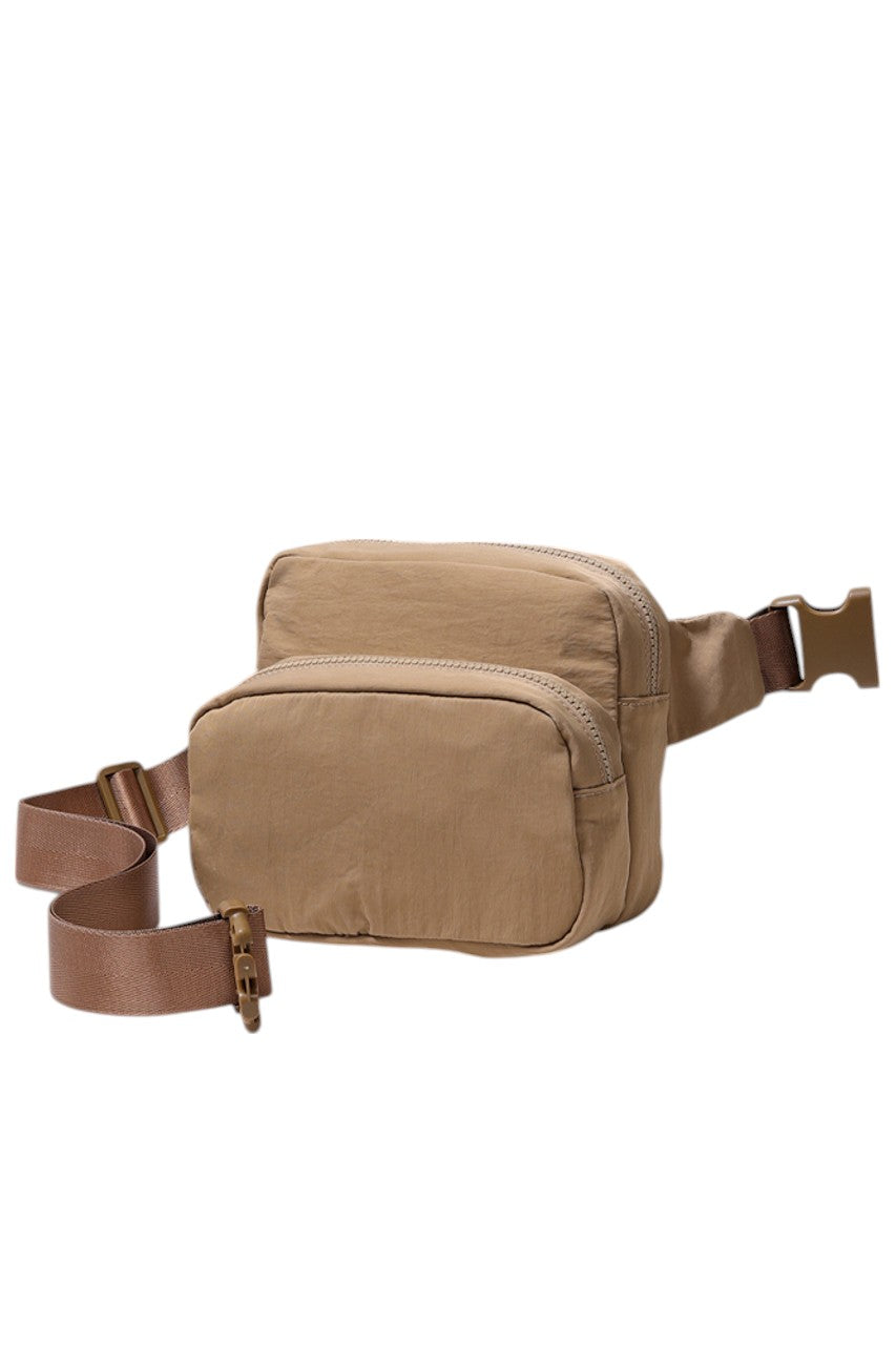 Solid Double Zipper Fanny Pack offers practical organization with two separate compartments, allowing you to store essentials while keeping them easily accessible and secure. Its durable construction ensures long-lasting use, making it ideal for travel, outdoor activities, or daily errands. The adjustable strap provides a comfortable fit, combining convenience and functionality in a sleek, minimalist design.