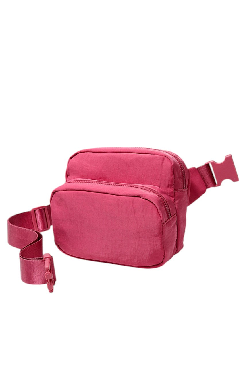 Solid Double Zipper Fanny Pack offers practical organization with two separate compartments, allowing you to store essentials while keeping them easily accessible and secure. Its durable construction ensures long-lasting use, making it ideal for travel, outdoor activities, or daily errands. The adjustable strap provides a comfortable fit, combining convenience and functionality in a sleek, minimalist design.