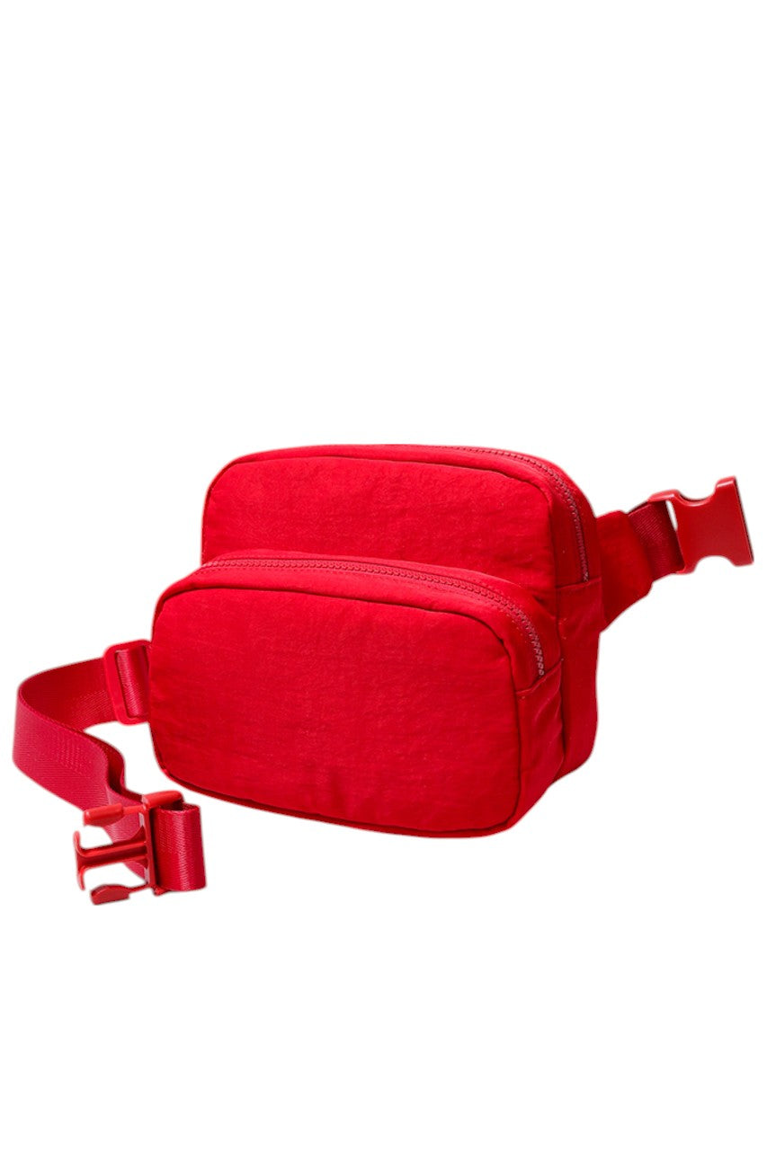 Solid Double Zipper Fanny Pack offers practical organization with two separate compartments, allowing you to store essentials while keeping them easily accessible and secure. Its durable construction ensures long-lasting use, making it ideal for travel, outdoor activities, or daily errands. The adjustable strap provides a comfortable fit, combining convenience and functionality in a sleek, minimalist design.