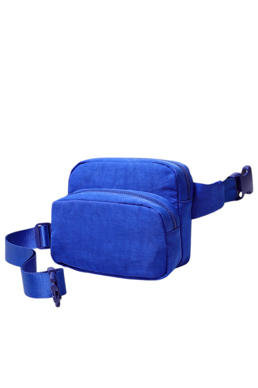 Solid Double Zipper Fanny Pack offers practical organization with two separate compartments, allowing you to store essentials while keeping them easily accessible and secure. Its durable construction ensures long-lasting use, making it ideal for travel, outdoor activities, or daily errands. The adjustable strap provides a comfortable fit, combining convenience and functionality in a sleek, minimalist design.