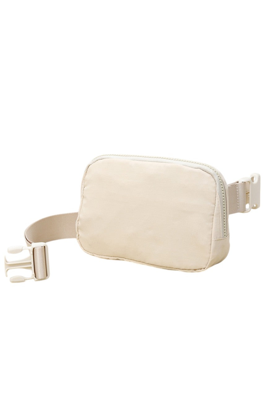 Solid Mini Fanny Belt Bag offers a compact and practical solution for hands-free carrying. Designed with durability and convenience in mind, its streamlined silhouette fits essentials securely while complementing a variety of styles. Ideal for active lifestyles, this belt bag ensures easy access and comfort without bulk, making it a versatile accessory for daily use or travel. 